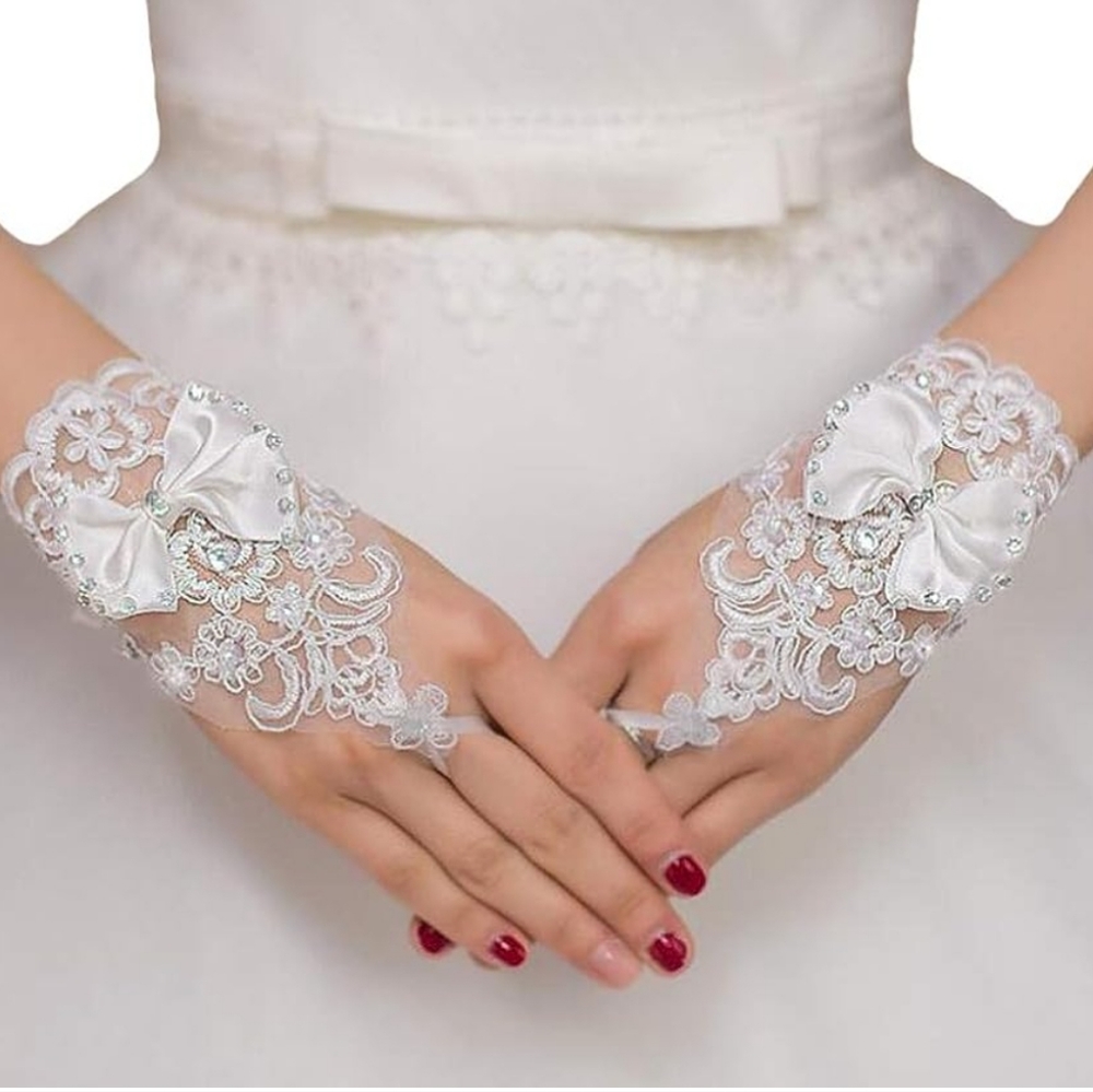 New white lace bridal gloves with bows and silver rhinestones